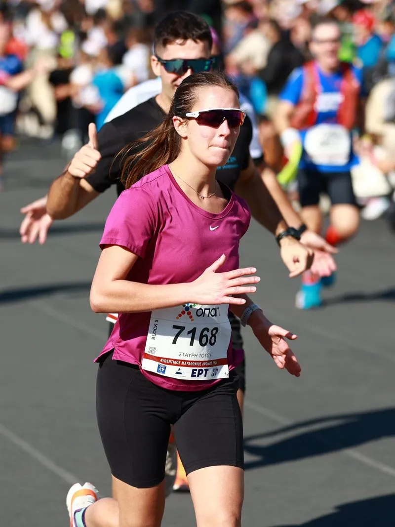 Runner crossing finish line